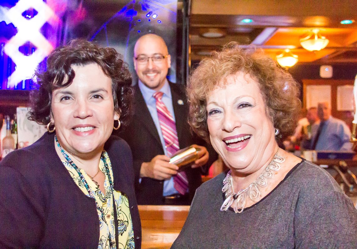 Fundraiser ladies smiling at camera