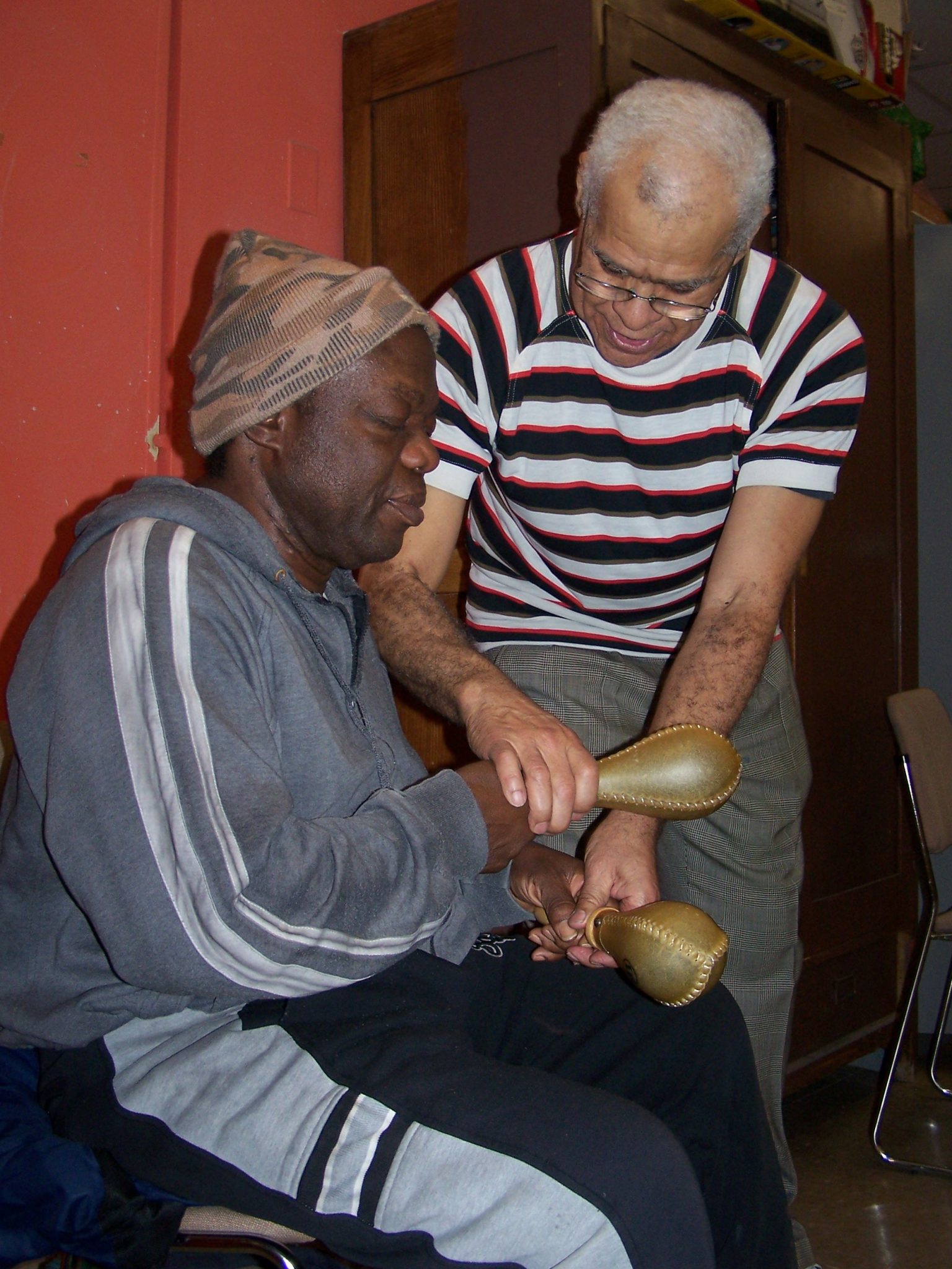 teaching a man how to hold marachas