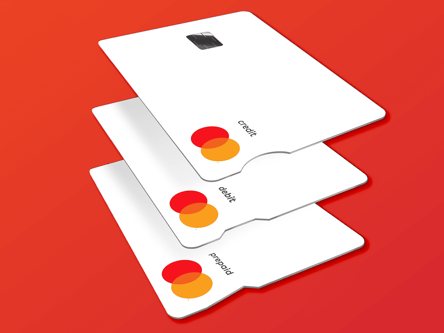 Three white cards with different notches cut into them sit on a bright red background
